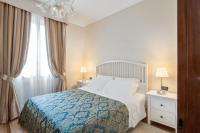 a bedroom with a bed and a large window at Hotel Montecarlo in Venice