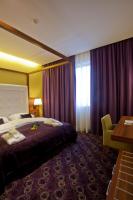 Posteľ alebo postele v izbe v ubytovaní Hotel Sport