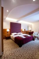 Posteľ alebo postele v izbe v ubytovaní Hotel Sport