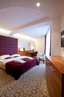 Posteľ alebo postele v izbe v ubytovaní Hotel Sport