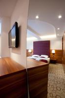 Posteľ alebo postele v izbe v ubytovaní Hotel Sport