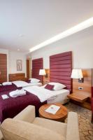 Posteľ alebo postele v izbe v ubytovaní Hotel Sport