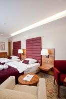 Posteľ alebo postele v izbe v ubytovaní Hotel Sport
