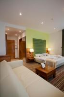 Posteľ alebo postele v izbe v ubytovaní Hotel Sport