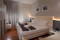 Łóżko lub łóżka w pokoju w obiekcie Hotel Ascot & Spa