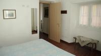 A bed or beds in a room at La Giara del Centro