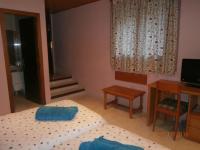 Postel nebo postele na pokoji v ubytování Hostal El Forn