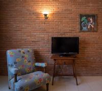 TV a/nebo společenská místnost v ubytování Apartaments Suites Sant Jordi