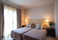 Postel nebo postele na pokoji v ubytování Apartaments Suites Sant Jordi