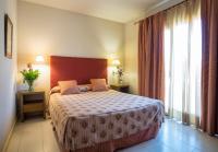 Postel nebo postele na pokoji v ubytování Apartaments Suites Sant Jordi