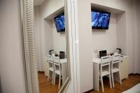 Televízia a/alebo spoločenská miestnosť v ubytovaní Maison Imperiale