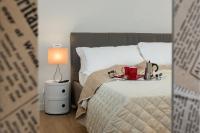 Posteľ alebo postele v izbe v ubytovaní Flats4rent