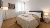 Posteľ alebo postele v izbe v ubytovaní Flats4rent