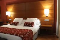 Posteľ alebo postele v izbe v ubytovaní Hotel Restaurante El Tollo