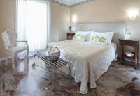 Posteľ alebo postele v izbe v ubytovaní Hotel Apollo