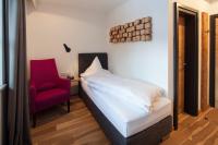 Postel nebo postele na pokoji v ubytování Boutique Hotel Gams