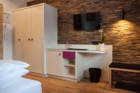 Postel nebo postele na pokoji v ubytování Boutique Hotel Gams