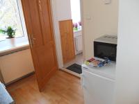 A kitchen or kitchenette at Leopoldauer Apartment