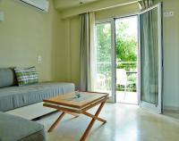 A seating area at Cosmos Apartments