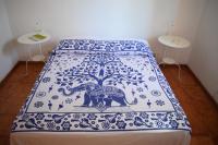 A bed or beds in a room at Casa Bedda