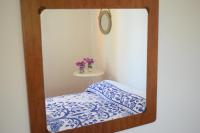 A bed or beds in a room at Casa Bedda