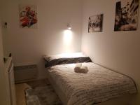 Posteľ alebo postele v izbe v ubytovaní Haustor Apartments
