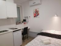 Kuchyňa alebo kuchynka v ubytovaní Haustor Apartments
