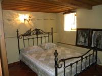A bed or beds in a room at House Rodia