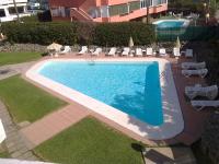 The swimming pool at or close to Apartamento Privado en Complejo Aida