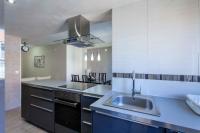Kuchyňa alebo kuchynka v ubytovaní Apartment Malvarrosa Beach Cavite
