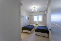 Posteľ alebo postele v izbe v ubytovaní Apartment Malvarrosa Beach Cavite