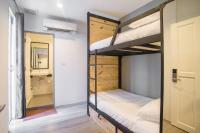 Postel nebo postele na pokoji v ubytování X9Hostel