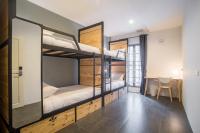 Postel nebo postele na pokoji v ubytování X9Hostel