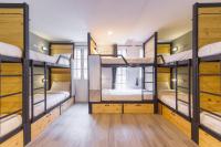 Postel nebo postele na pokoji v ubytování X9Hostel