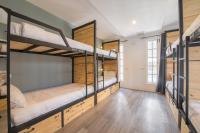 Postel nebo postele na pokoji v ubytování X9Hostel