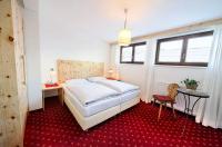 Łóżko lub łóżka w pokoju w obiekcie Apartments Nindl
