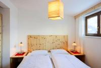 Łóżko lub łóżka w pokoju w obiekcie Apartments Nindl