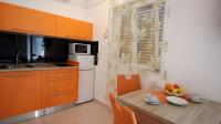 Kuchyň nebo kuchyňský kout v ubytování Apartments Gajo