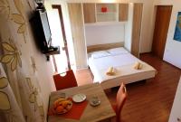 Postel nebo postele na pokoji v ubytování Apartments Gajo