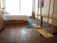 Posteľ alebo postele v izbe v ubytovaní Industia Loft Apartment