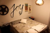 Postel nebo postele na pokoji v ubytování Le Dame Della Cortesella B&B