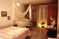 Postel nebo postele na pokoji v ubytování Le Dame Della Cortesella B&B