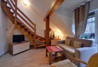 Część wypoczynkowa w obiekcie Klimatyczne Apartamenty Sun Seasons 24 w Szklarskiej Porębie by Noclegi Renters