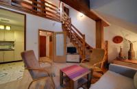 Telewizja i/lub zestaw kina domowego w obiekcie Klimatyczne Apartamenty Sun Seasons 24 w Szklarskiej Porębie by Noclegi Renters