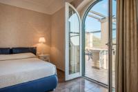 Posteľ alebo postele v izbe v ubytovaní Collina Degli Ulivi B&B