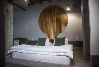 A bed or beds in a room at ThessHomeLiving