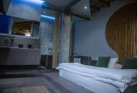 A bed or beds in a room at ThessHomeLiving
