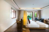 Postel nebo postele na pokoji v ubytování Ayrest Hua Hin Hotel