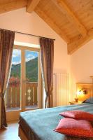 Hotel Garnì La Soldanellaにあるベッド