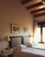 Łóżko lub łóżka w pokoju w obiekcie Hotel rural Los Manzanos